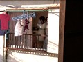 ベランダで通行人の視線を感じながら犯され欲情する人妻